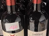 several bottles of wine are on display in a store