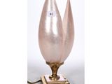 an image of a pink glass lamp with a gold base
