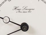 a close up of a clock with roman numerals on it