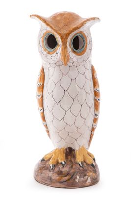 an image of an owl figurine on a white background