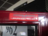 a red door with a sign that says fridford