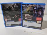 the two blu - rays are sitting on the table