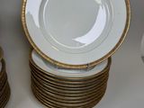 many plates that are stacked on top of each other