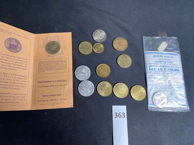 a book with a bunch of coins in it on a table