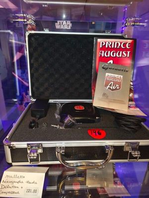 a case with a gun and a book on it