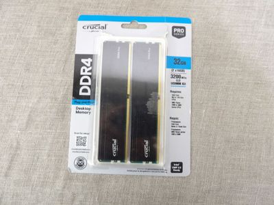 two black ddrag memory cards are in a package on a table