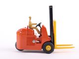 a toy forklift truck with a man sitting on it