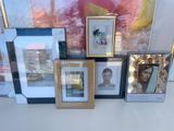 a lot of pictures on the table with pictures on it