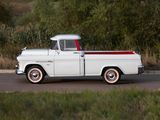 a white truck that is parked on the side of the road
