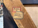 a piece of wood that has a sticker on it