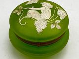 a green box with a picture of a woman on it