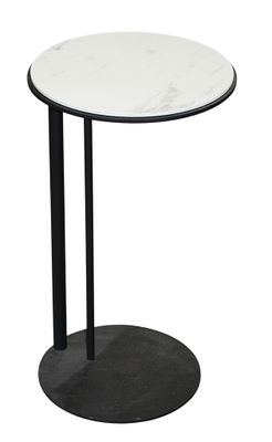 a white marble table with black metal legs and a black base