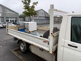 a white truck that is parked on the side of the street