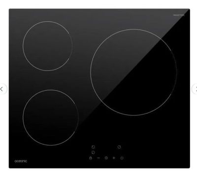 a black stove top with three burners and three burners
