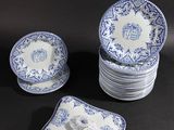 set of six blue and white plates with blue and white designs on them