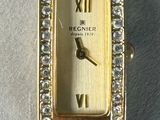 an image of a close up of a wrist watch with diamonds on it