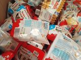 a cardboard box filled with lots of food and snacks