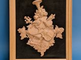 an image of a framed picture of a woman with a hat and flowers