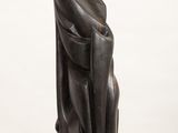 an image of a sculpture of a woman ' s head on top of a white pedestal