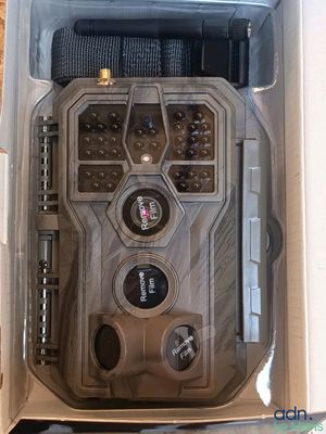 a box with a camera inside of it on a table