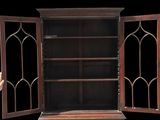 a wooden bookcase with a glass door and a hand reaching out of it