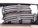a box with a bunch of train tracks inside of it
