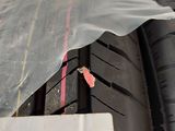a close up of a tire with a sticker on it