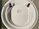 an overhead view of a toilet with the lid up