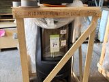 a small table with a laptop on top of it