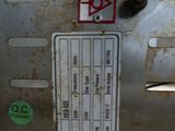 a close up of a metal box with a label on it