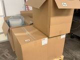 two boxes stacked on top of each other in a room