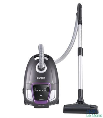 un aspirateur noir et violet muni d'une poignée argentée