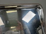 a man taking a picture of himself in the mirror