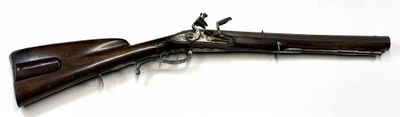 a gun that is sitting on a table