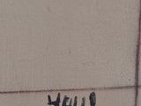 an image of a close up of a piece of fabric with writing on it