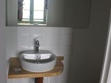 a bathroom with a sink and a toilet in it
