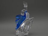 une image représentant une figurine en verre représentant une femme coiffée d'une couronne