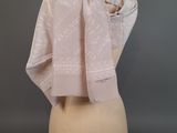 a close up of a mannequin torso with a scarf on it