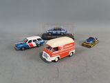 three toy cars that are sitting next to each other
