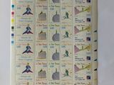a picture of a sheet of stamps with a picture of a man on a skateboard