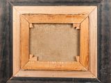 an old picture frame with a chalkboard underneath it and a chalkboard underneath it