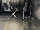 two chairs and a table in the back of a truck