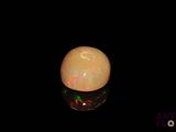 an oplite is shown in the dark with a black background