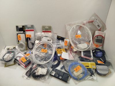 a pile of electronics that is sitting on a table