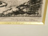 a black and white drawing of a cat laying on a bed