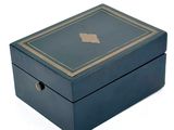 a small wooden box with a map on it