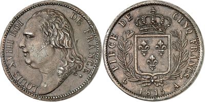 a silver coin with a crown on the front and a crown on the back