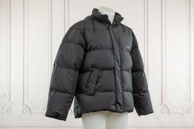 the jacket is black and has a hood on it