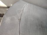 a bug that is sitting on the seat of a car