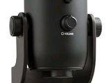 the microphone is on a stand with a white background